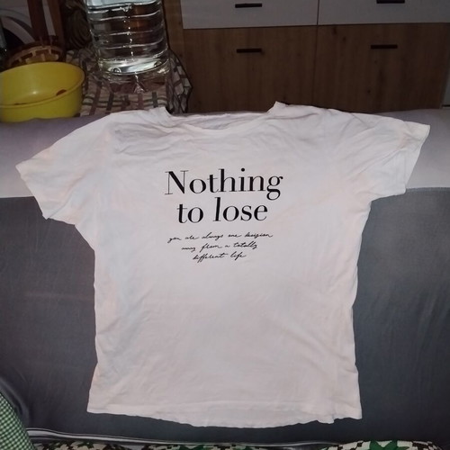 Λευκό γυναικείο T-shirt με κλασική γραμμή και στάμπα "Nothing to lose"