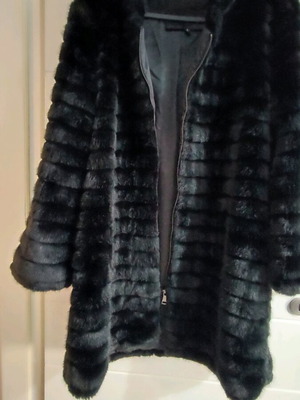 Black faux fur with zipper and hoodie, like new, size M