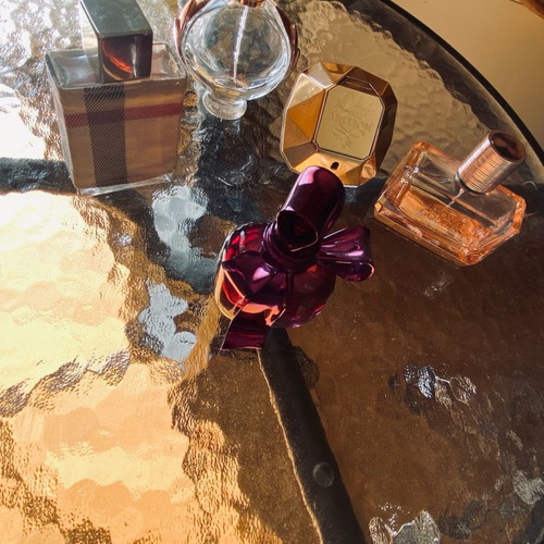 Empty perfume bottles used, branded