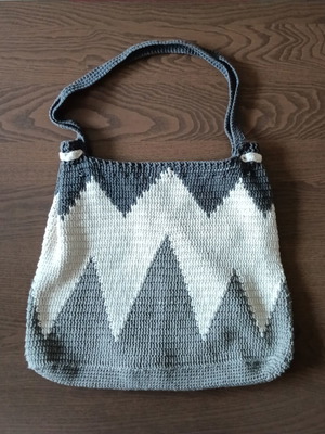 Handmade knitted shoulder bag like new with geometric patterns