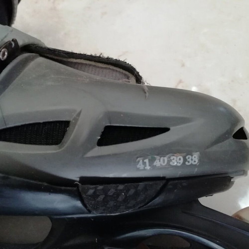 Adjustable black inline rollers used, sizes 38-41 for girls and boys