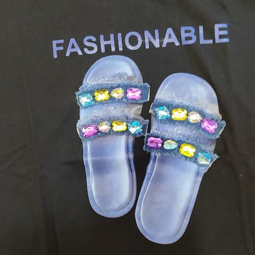 Black Graphic T-Shirt size M like new with sandal print and stones