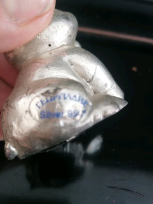 Silver piglet figurine used, not solid silver
