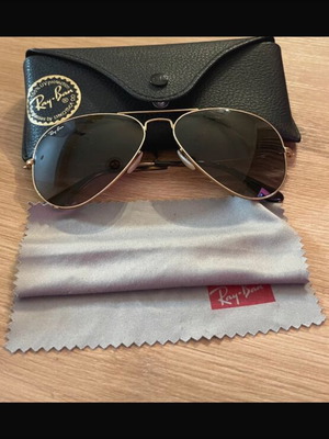 Ray Ban sunglasses like new, gold color with case and cloth