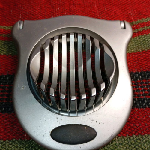 Metal egg slicer used