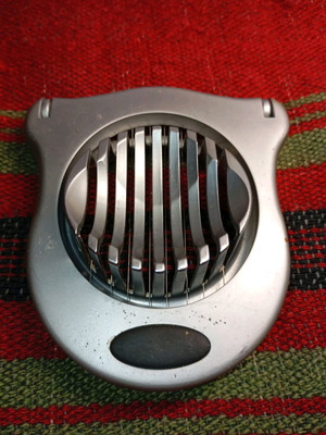 Metal egg slicer used