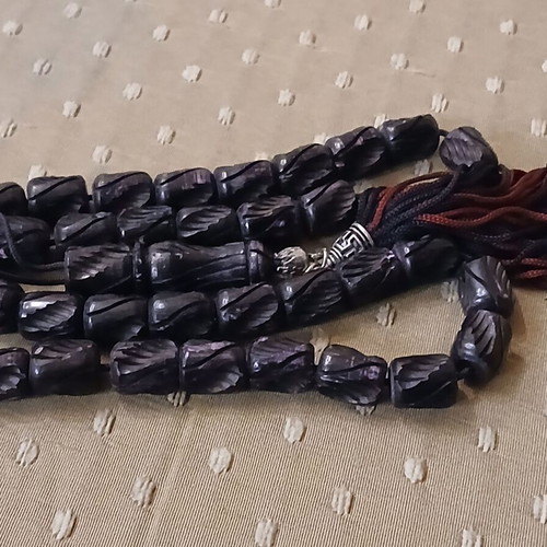 Komboloi bone engraved worry beads used with metal elements and tassel