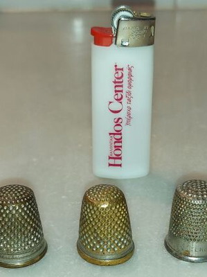 Collection of used thimbles over 40 years old