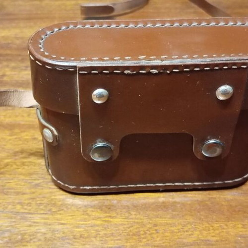 Retro Smena-4 camera used with leather case and tripod mount