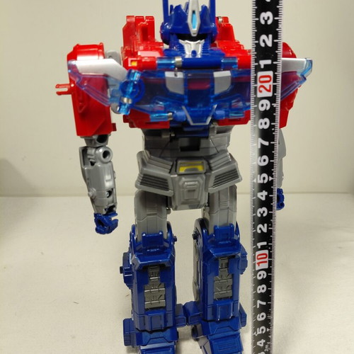 Transformers One Power Flip Optimus Prime Hasbro used, missing parts, light works