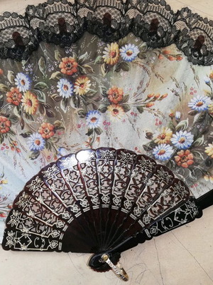 Fan made of fabric and plastic like new