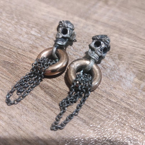 Earrings used with skull design