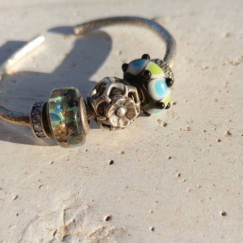 Hammered silver bracelet with Murano charms like new