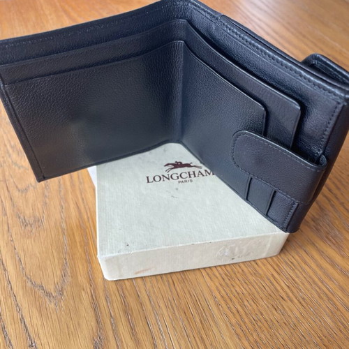 Longchamp leather wallet new, black with coin and bill compartments