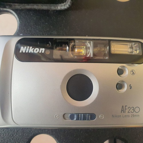 Nikon AF230 camera used with 29mm lens and case