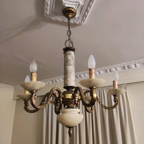 Vintage chandelier used, made of bronze and natural stone