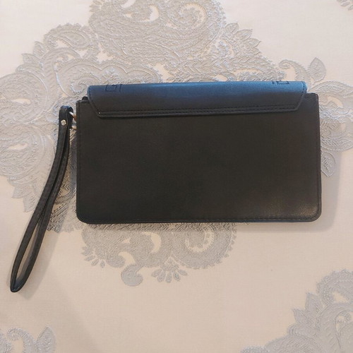 Women's wallet like new with discreet meander design black