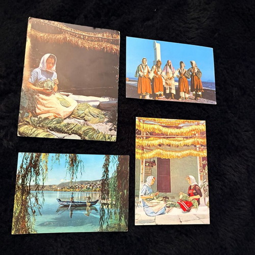 Set of 4 used vintage postcards with folklore theme