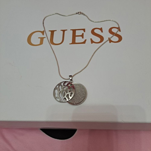 Silver chain with pendant like new, pendant not silver