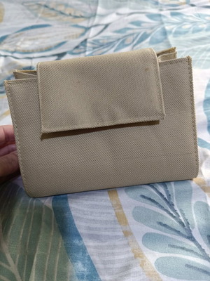 Small beige toiletry bag like new