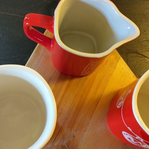 Collectible Nescafé cups and milk jug like new