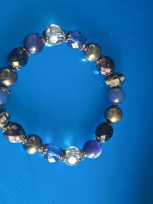 Elastic bracelet like new with decorative beads and rhinestones blue silver