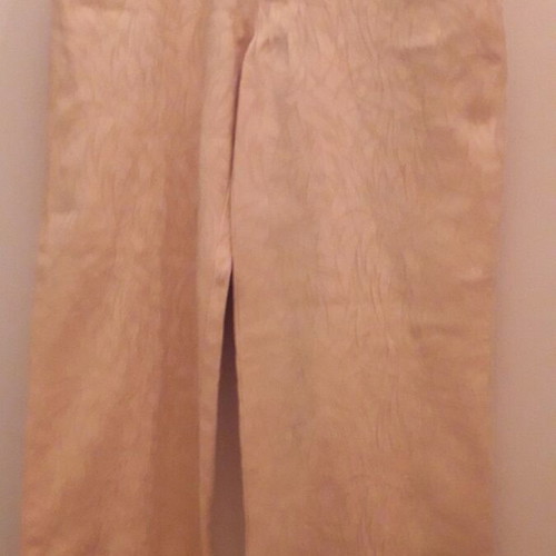 Guess women's pants used, beige with embossed patterns, size Small