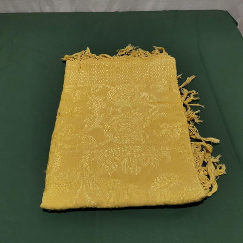 Sofa throw or blanket used with signs of wear, circa 1930