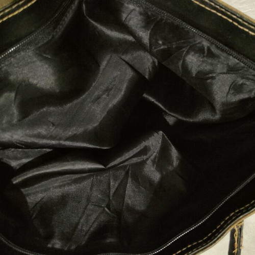 Handbag used with beige-brown stripes, plastic fabric