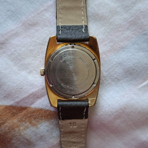Wostok gold-plated mechanical watch used, brown and gold