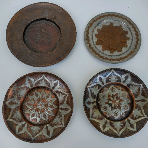 Copper Greek handmade carved wall plates used, all together