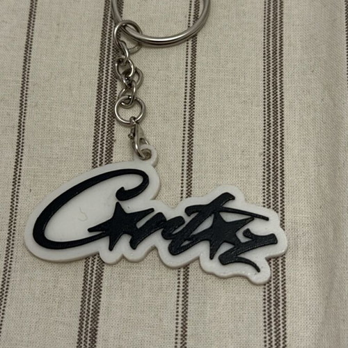 Corteiz keychain new, black and white