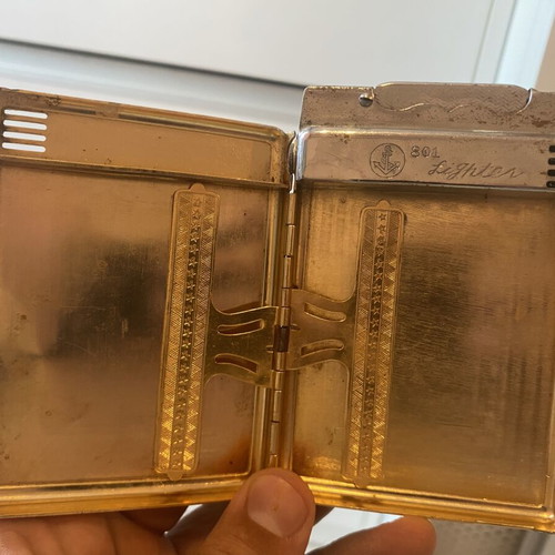 Tobacco case with petrol lighter used