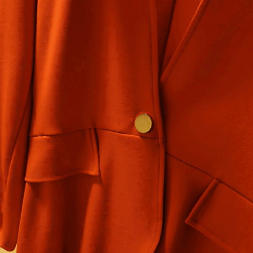 Spring jacket orange like new, asymmetric with gold button