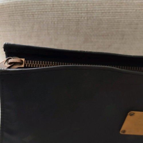 MCM unisex black nylon clutch used with leather interior