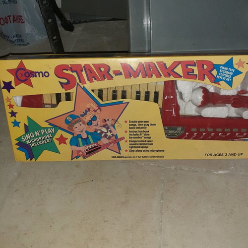 Old piano toy in red color new