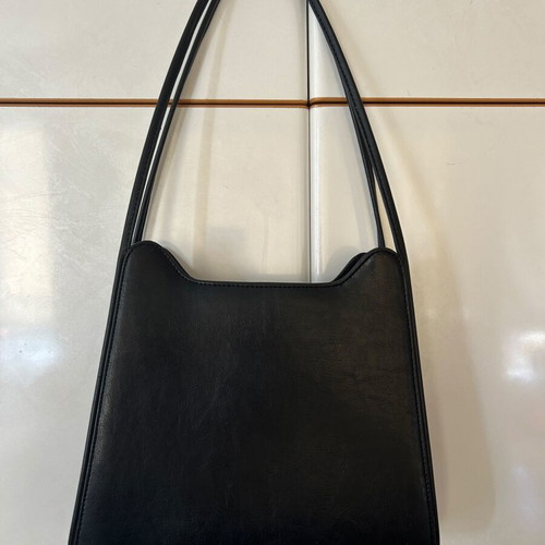 Black shoulder bag used with surface scratch