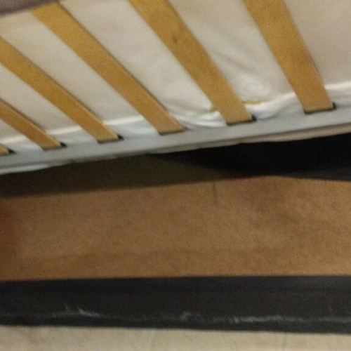 Sofa bed used, three-seater black with Amsterdam cover and storage