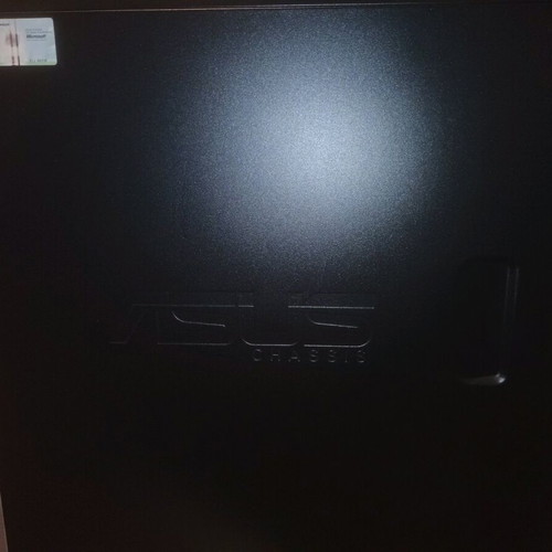Asus computer tower used with stand and keyboard
