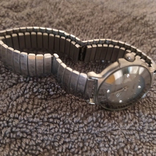Women's watch used with elastic grey silver bracelet