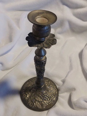 Antique alpaca candle holder used