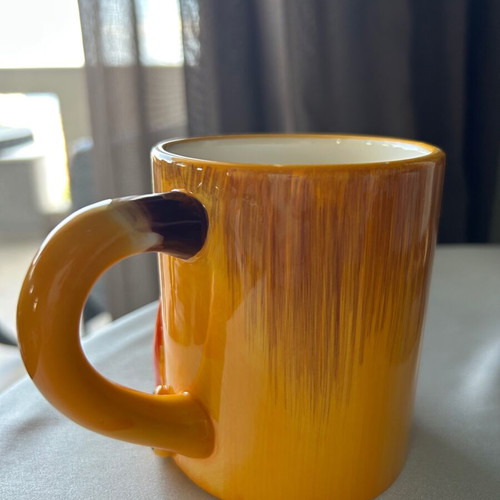 Children's ceramic mugs used, vintage with embossed elephant and lion