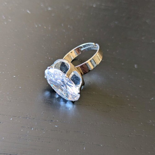 Silver ring like new with white transparent stone and adjustable size