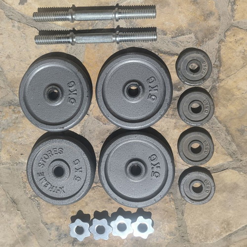 Dumbbell set used with weight plates for home training