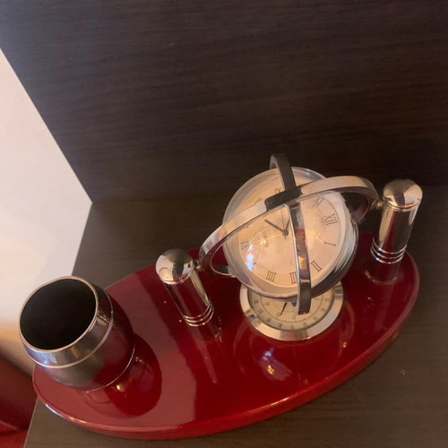 Desk decoration used with globe and pencil holder on wooden base