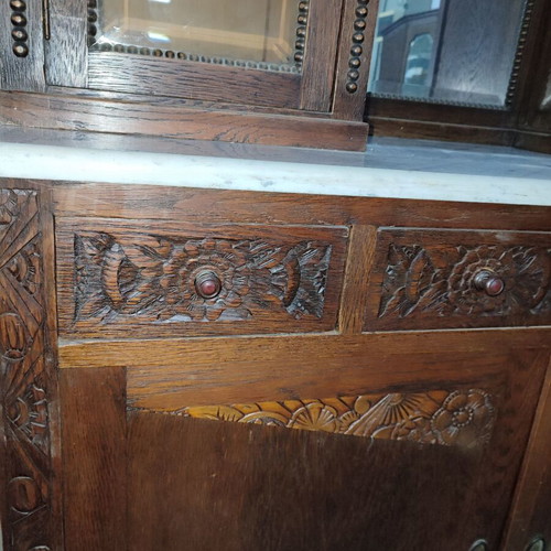 Carved antique buffet used with marble top and mirror