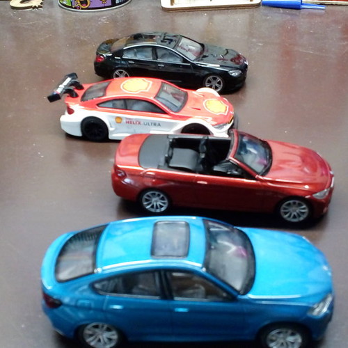 Toy cars used, set of 4 with forward motion