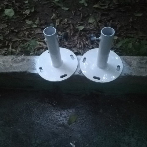 Heavy-duty umbrella bases made of solid iron for professional umbrellas with floor plugs