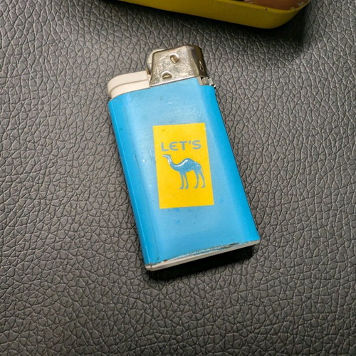Camel box and lighter used with signs of wear