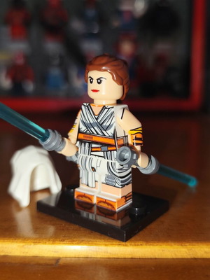 Rey figure like new with base, two blue lightsabers, hood